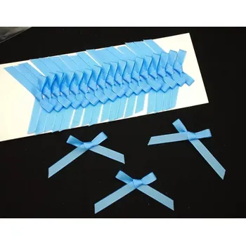 Svatební dekorace Svatební mašlička světle modrá 20 ks