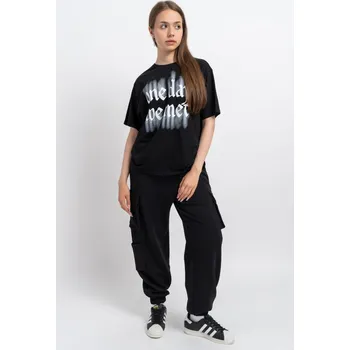 Reporter Young | Dívčí černé oversize tepláky s kapsami na nohavicích a nášivkou - Barva ČERNÁ, Velikost 152 243-0117G-26-100-1