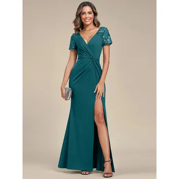 Dámské šaty Večerní šaty s nášivkami a hlubokým výstřihem do V Barva: Tyrkysová, Velikost: 8XL