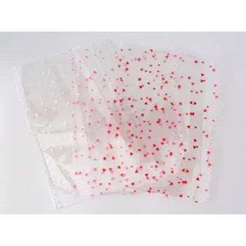 Dárková taška Celofánové sáčky s potiskem srdíček 13 x 18 cm - BÍLÉ