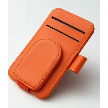 Sada dvou držáků do auta na brýle karty vstupenky a pero na sluneční clonu magnetické upevnění odolný plast a umělá kůže oranžová