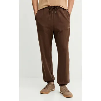 Tepláky Tommy Hilfiger pánské, hnědá barva, UM0UM03627 88X, vel. M