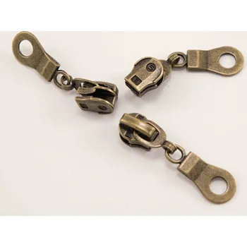 Zip Jezdec do plastového spirálového zipu - s ozdobou - starokov - velikost 5