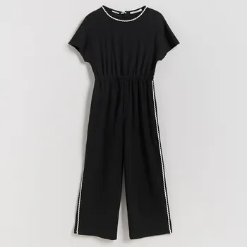 Dívčí šaty Reserved - Overal se strukturou a lampasem - černý - 286FW-99X - 286FW-99X-146