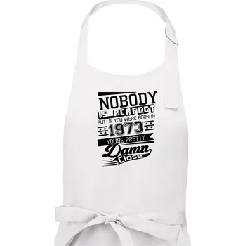 Kuchyňská zástěra Nobody is perfect - 1973 - Dámská zástěra na vaření - Univerzální velikost ( Bílá )