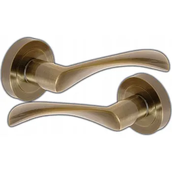 Dveřní kování KLIKA DVEŘNÍ SE ZPĚTNÝM CHODEM PRO DVEŘE SALIX S KULATOU ROZETOU PATINA