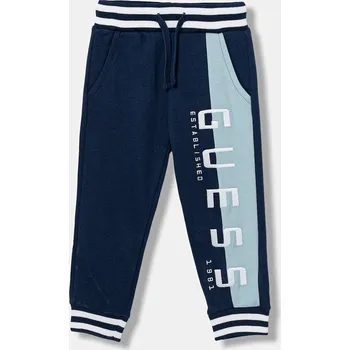 Dětské bavlněné tepláky Guess N5BQ13.KAX74.9BYA námořnická modř 59X, vel. 88-96