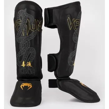 Chránič holeně pro bojový sport Chrániče holení VENUM Serpenti - černo/stříbrno/zlaté - VENUM-05757-109 Velikosti: L