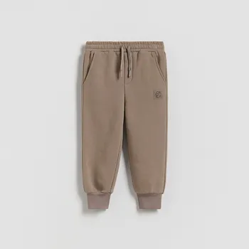 Chlapecké kalhoty Reserved - Teplákové joggery - tmavě hnědá - 094FO-89X - 094FO-89X-98