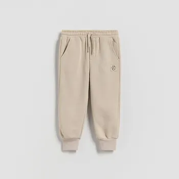 Chlapecké kalhoty Reserved - Teplákové joggery - béžová - 094FO-08X - 094FO-08X-86