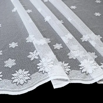 Vánoční záclona Vločky obšití okrajů 110 bílá vánoční 110x245 cm