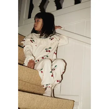 Chlapecké kalhoty Dětské bavlněné tepláky Konges Sløjd MALLI GLITTER PANTS GOTS KS103894.9BYA béžová 01X, vel. 104