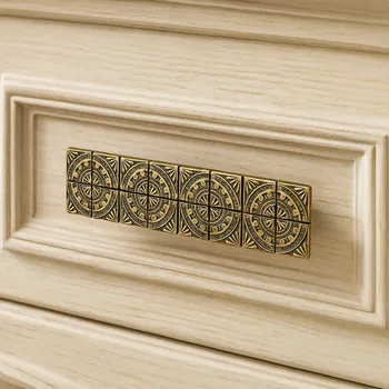 Nábytkové kování Interex Úchytka MEZZO / Mosaz patina 128 mm