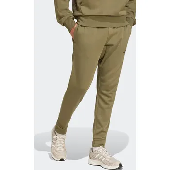 ADIDAS Pánské běžecké tepláky Essential Feelcozy S ZELENÁ