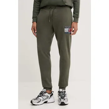 Bavlněné tepláky Tommy Jeans DM0DM22094 zelená 97X, vel. XL