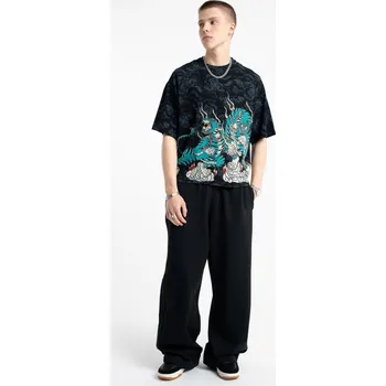 Reporter Young | Chlapecké černé tepláky se širokými nohavicemi a gumou v pase - Barva ČERNÁ, Velikost 152 253-0117B-47-100-1