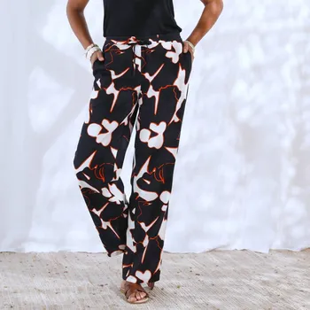 Dámské kalhoty Široké pružné kalhoty s potiskem XXL vzoru černá/bílá 42