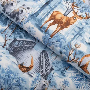Bavlněná látka/plátno Sandra SA-674 Lesní zvířata v zimním lese na modrém - šířka 160 cm