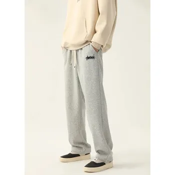 Pánské volné tepláky s moderním designem pro sport i volný čas Barva: Šedá, Velikost: L