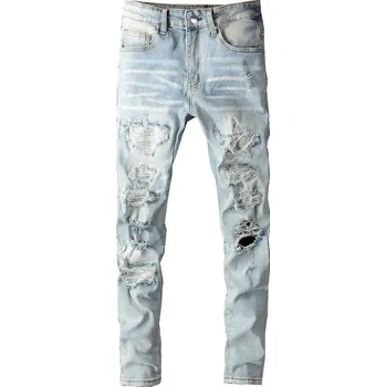 Pánské džíny Pánské džíny s dírami a flitry – stylový streetwear Barva: Modrá, Velikost: 29