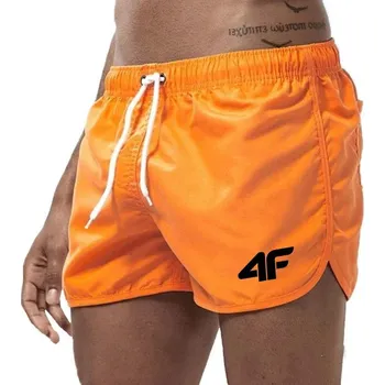Pánské kraťasy Pánské letní kraťasy – rychleschnoucí, vhodné na pláž i sport Barva: Oranžová, Velikost: XL