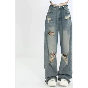 Dámské džíny Dámské retro džíny s dírami – volný střih s vysokým pasem Barva: Modrá, Velikost: XL