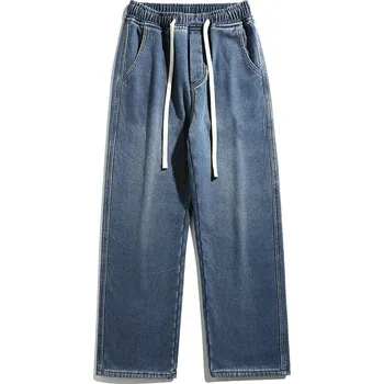 Pánské kalhoty Pánské zateplené rifle s fleecem ve volném retro střihu Velikost: XL, Barva (Varianta): Tmavě modrá