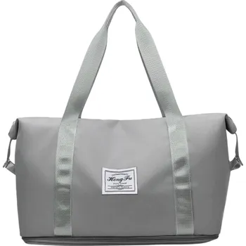 Sportovní taška Dámská cestovní sportovní taška z odolného nylonu s popruhem přes rameno, uchy do ruky a upevněním k rukojeti kufru šedá