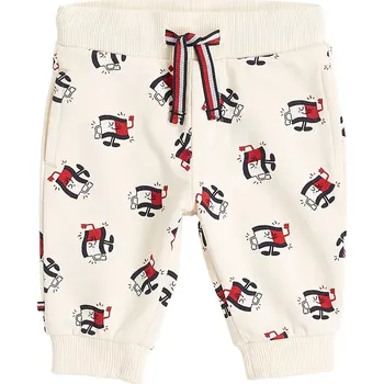 Kojenecké tepláky Tommy Hilfiger béžová barva, KN0KN02027 KN0KN02027.PPYA 01X, vel. 62