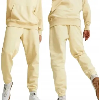 Pánské oblečení Puma pánské tepláky 535597_88_M béžové, velikost M