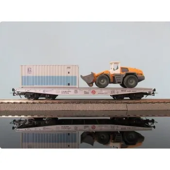 Modelová železnice H0 - limitovaná edice - plošinový vůz s kontejnerem a pásovým traktorem ep.V