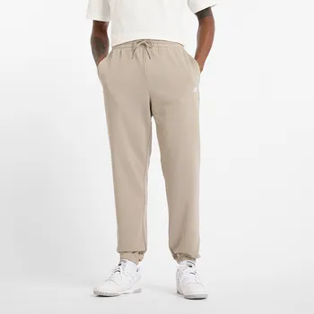 Pánské kalhoty New Balance MP41519ADS – béžové