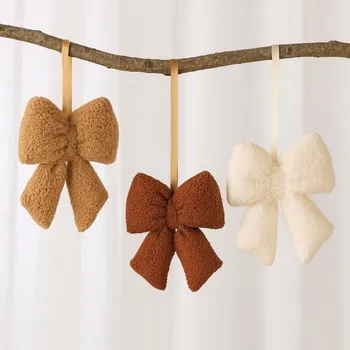 Vánoční dekorace BOLTZE Závěsná dekorace mašle 21 cm Barva: Béžová