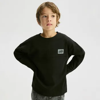 Dětská móda Reserved - Bavlněné tričko s dlouhými rukávy - černý - 579FJ-99X - 579FJ-99X-134