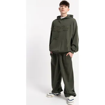 Reporter Young | Chlapecké tmavě zelené tepláky OVERSIZE bez potisku - Barva ZELENÁ, Velikost 146 253-0117B-05-570-1