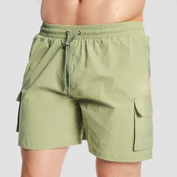 Pánské kraťasy GymBeam Men‘s Swim Cargo Shorts Olive M zelená