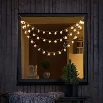 Lampička Konstsmide Christmas LED světelný závěs, 44 teplá bílá zářící vločka - vzdálenost mezi světly 11,3 cm; celková délka 1 125 cm; délka kabelu se zástrčkou 1 000 cm čirá 44 x 0,03 W LED - Doprava zdarma