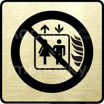 Informační tabulka Zlatý piktogram "tento výtah neslouží k evakuaci osob" s černým&nbsp;textem a rámečkem&nbsp;-