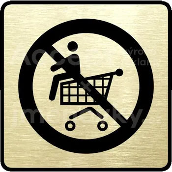 Značení Zlatý piktogram "zákaz jízdy na nákupním vozíku" s černým textem a rámečkem -