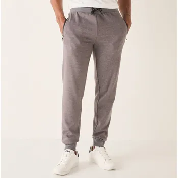 Dámské kalhoty Sportovní kalhoty se zúženými konci a kontrastními detaily šedý melír 48/50