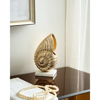 Dekorativní figurka soška Zlatý kovový ornament ve tvaru mušle pro vystavení Dekorativní ornament Beliani