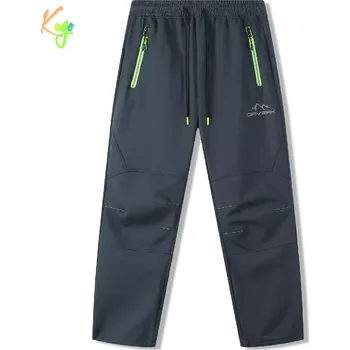 Chlapecké kalhoty Dětské sofshellové kalhoty zateplené Kugo HK9787 šedá / zelený zip