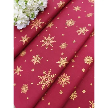 Látka 100% bavlna - velké zlaté vločky na vínové