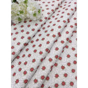 Látka 100% bavlna - červené vánoční hvězdy na smetanové