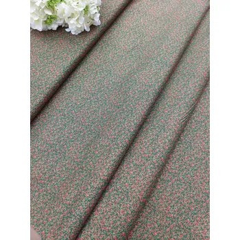 Látka 100% bavlna - červené vánoční bobule na zelené