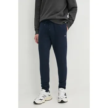 Dámské kalhoty Tepláky Tommy Jeans tmavomodrá barva, hladké, DM0DM20473 59X, vel. M