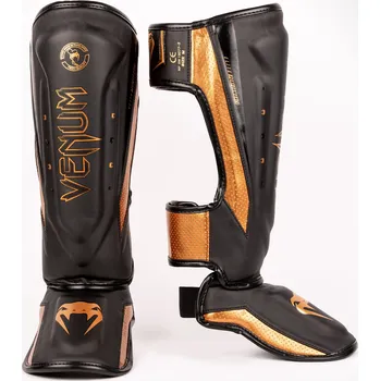 Chránič holeně pro bojový sport Chrániče holení VENUM ELITE Evo - černo/zlaté - VENUM-04261-137 Velikosti: L