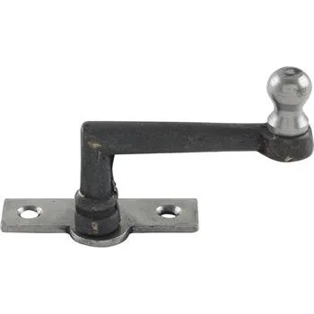 Okenní klika Okenní obrtlík železný na hranaté, vyosené podložce, 15 mm, šedá litina surová