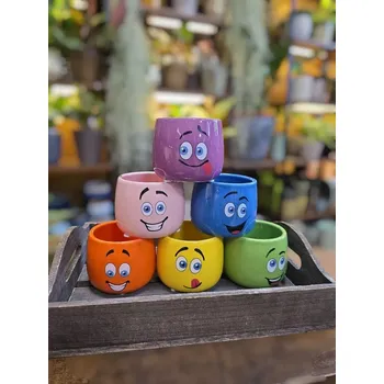 Keramický obal s obličejem mix barev na pr. 6cm