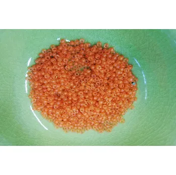 Dětské navlékací korálky Korálky PRECIOSA rokajl vel.10/0 - čirá s oranžovým průtahem - 10g